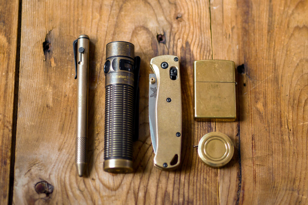 EDC flatlay of brass gear